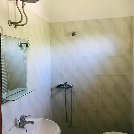 Apartmán Rrjoll_rooms_clandestino *
